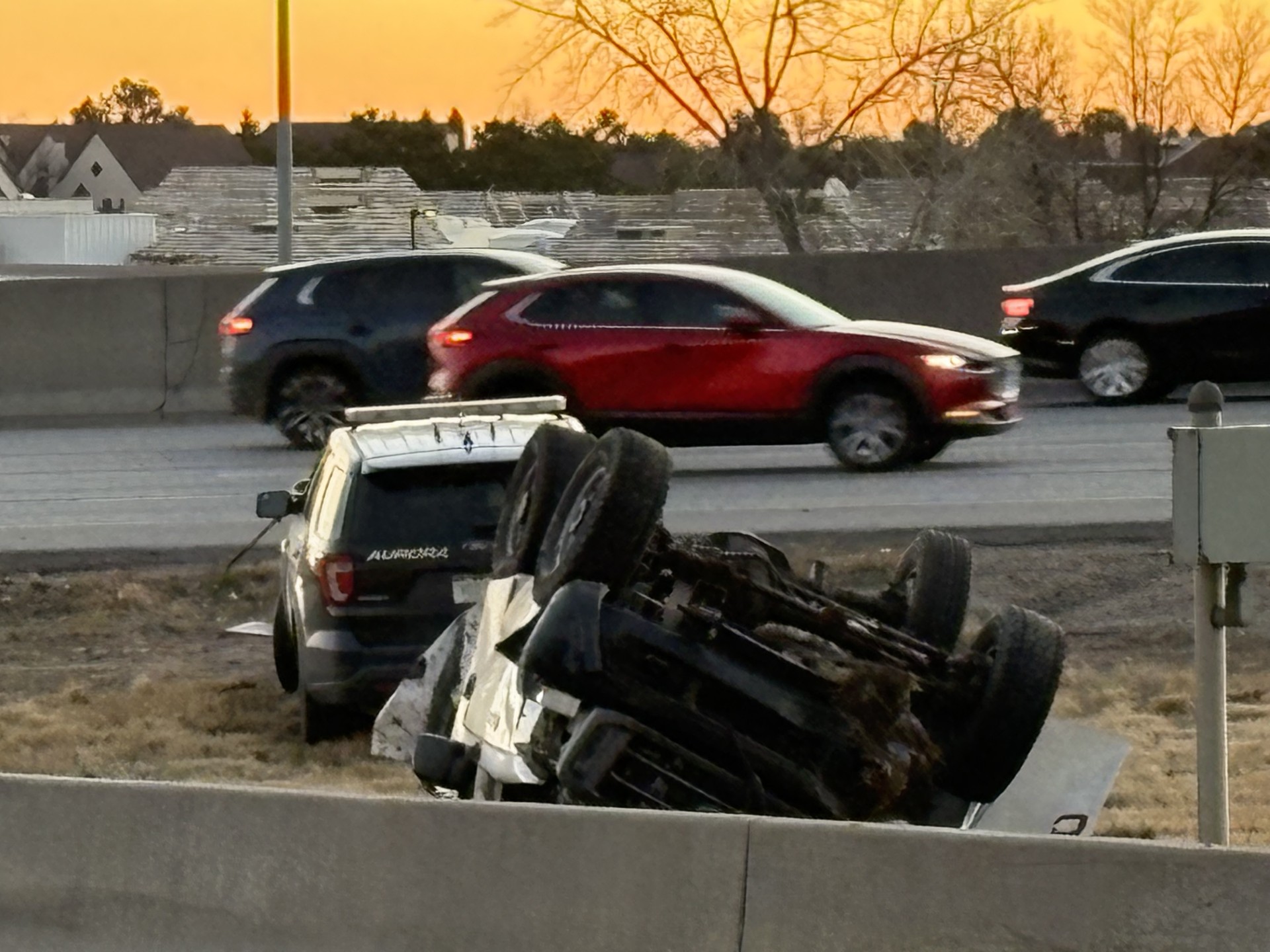 2 suspects in custody after shots fired at police during chase, crash on I-25