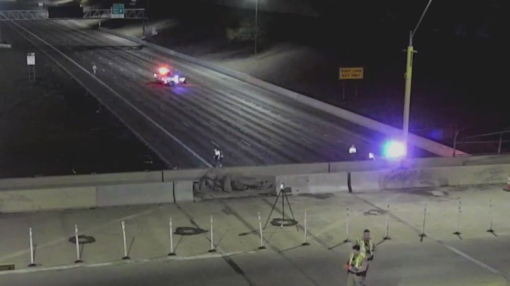 Vehicle plunges from I-10 overpass, collides with barrier
