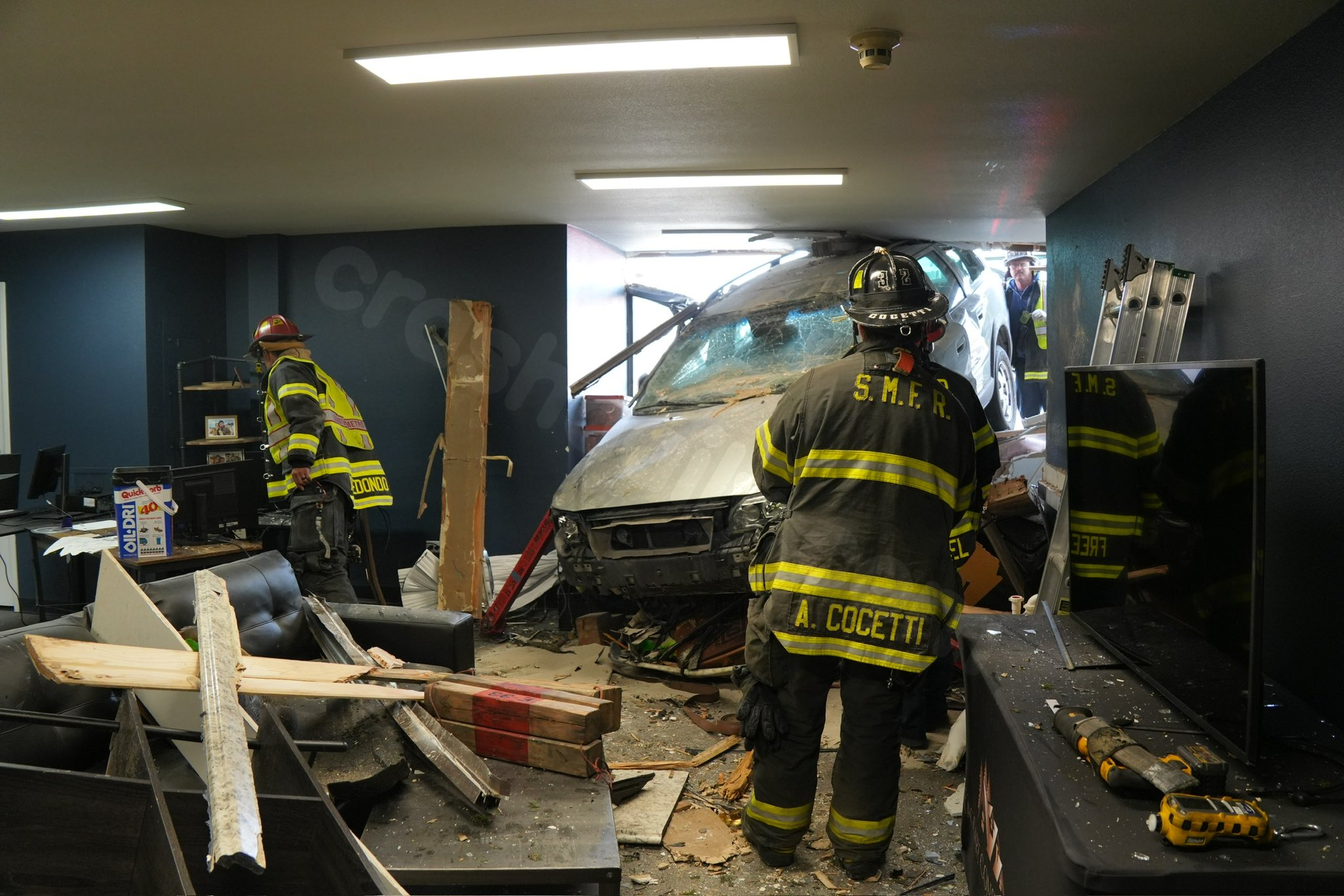 Car crashes into Centennial building, one person taken to hospital