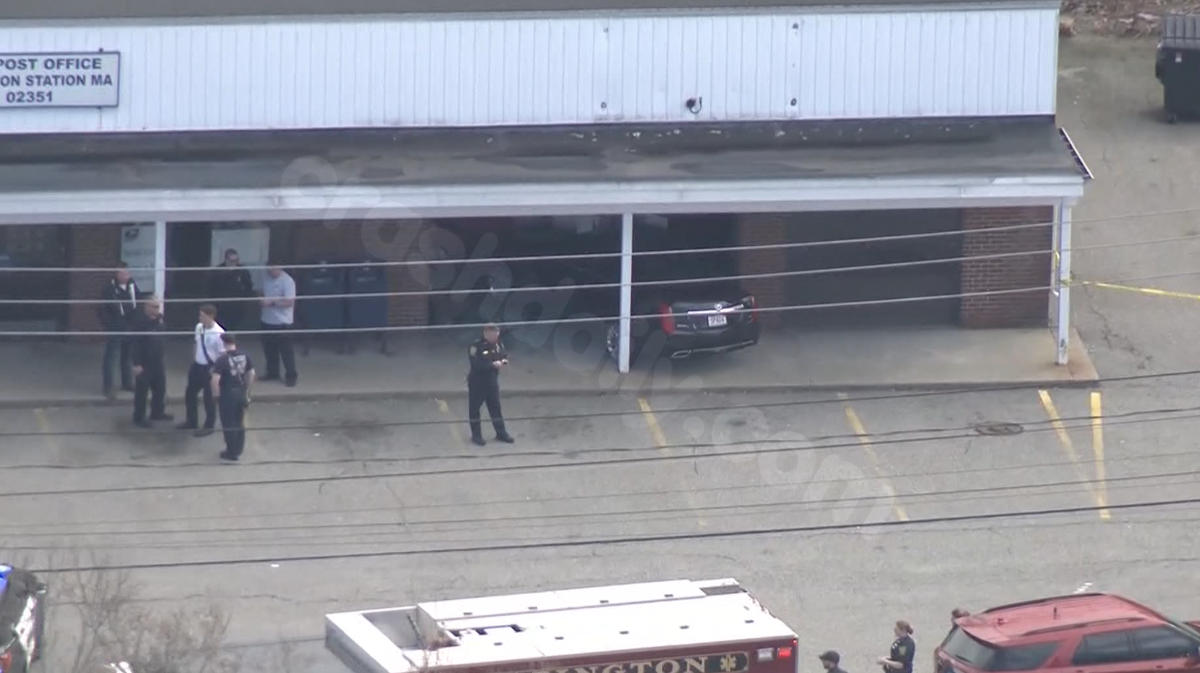 Car crashes into shopping plaza in Mass. town