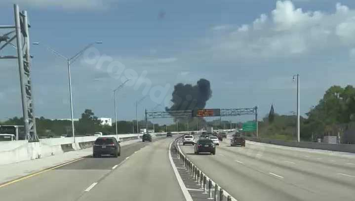 Car engulfed in flames after small plane crashes in Boca Raton