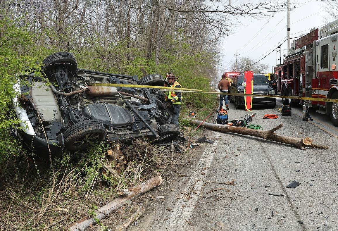 IMPD: Open container found in mangled vehicle after crash sends 2 to hospital