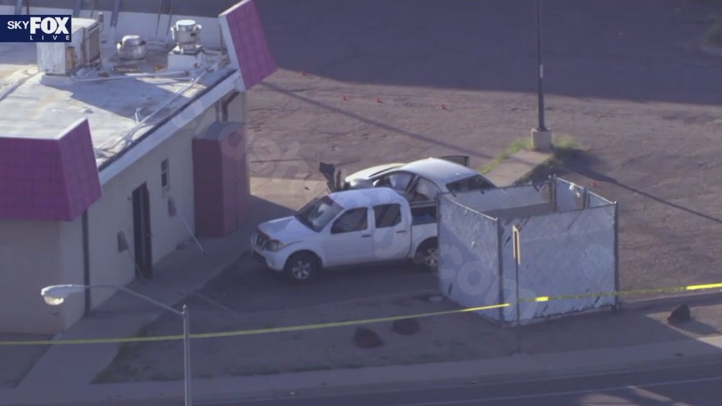 Car crashes into Peoria building after possible shooting: PD