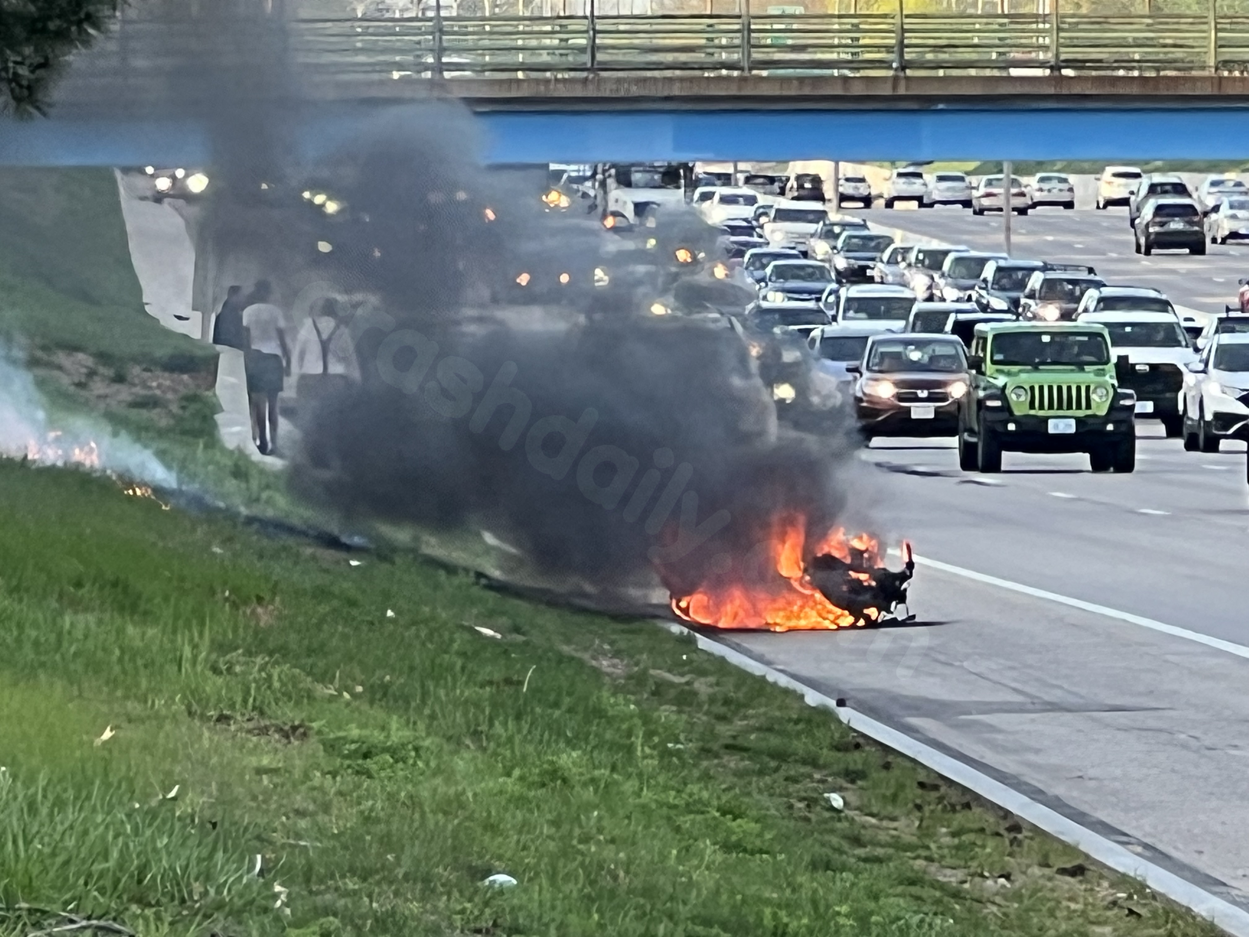 Motorcyclist injured in fiery highway crash