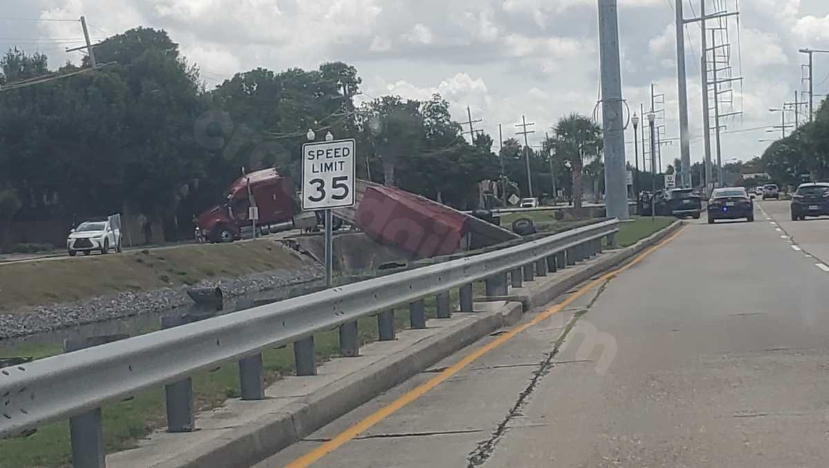 Tractor-trailer plunges into canal following collision in Metairie