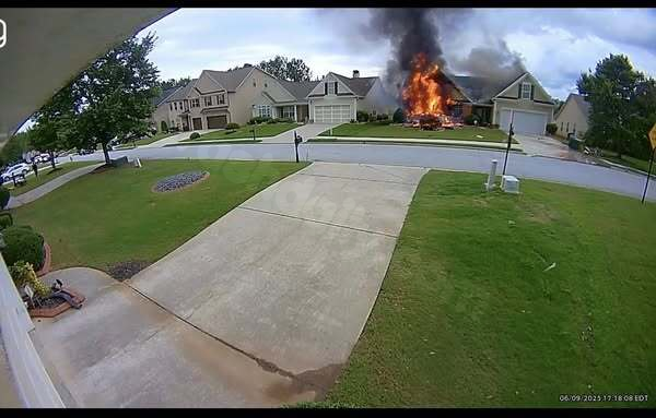 Car collides with Union City residence, causing fire