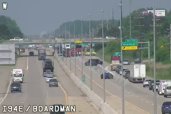 Fatal collision involving truck and semi-truck near Jackson on I-94 overpass.