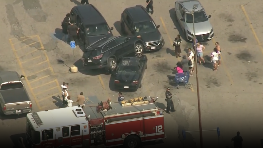 SUV crashes onto car in Massachusetts parking lot