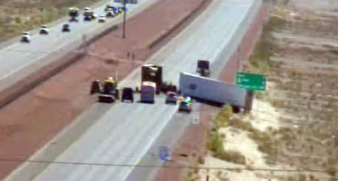 Truck accident causing lane closures on I-15 northbound near Las Vegas Speedway