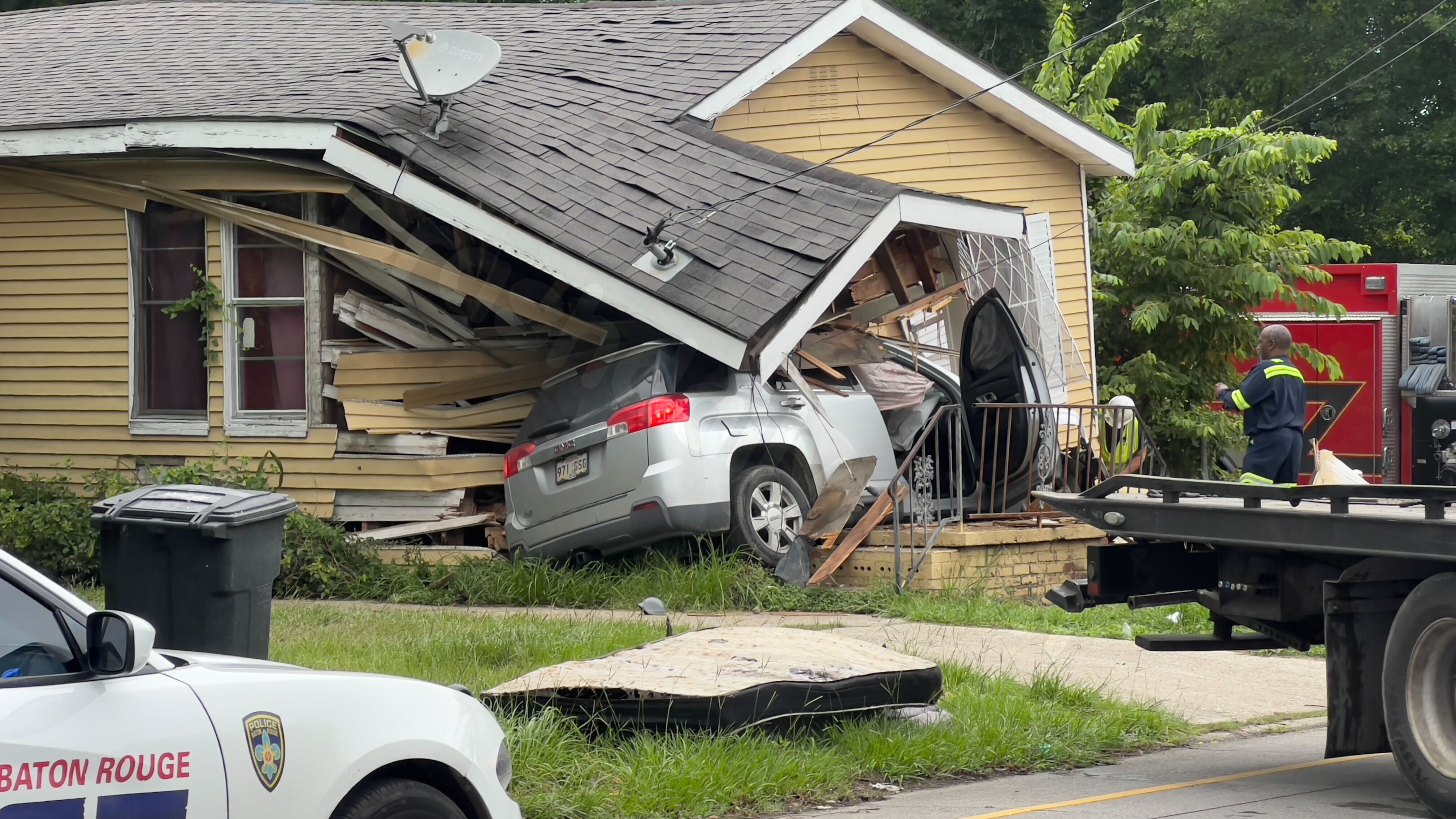 Six people displaced after vehicle slams into residence in Baton Rouge