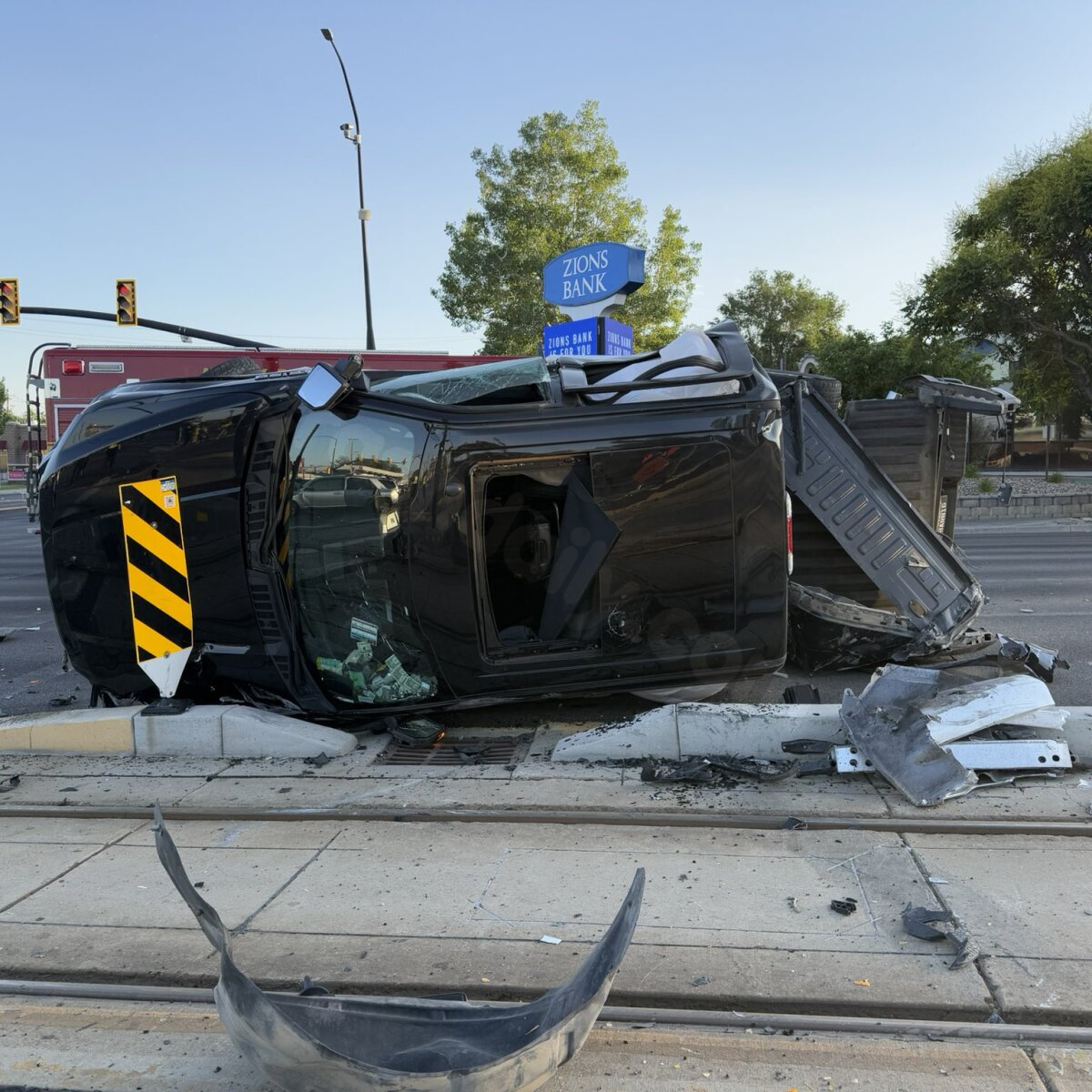 UTA TRAX blocked by three-car crash with vehicle overturned