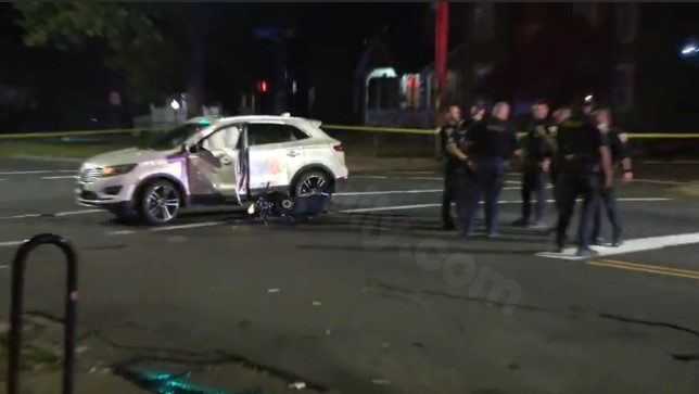 Street closure in New Haven due to car crash and motor scooter incident.