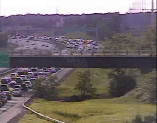 Car on I-290 W ignites in solo crash.