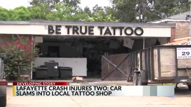 Two injured in Lafayette collision; vehicle crashes into nearby tattoo parlor