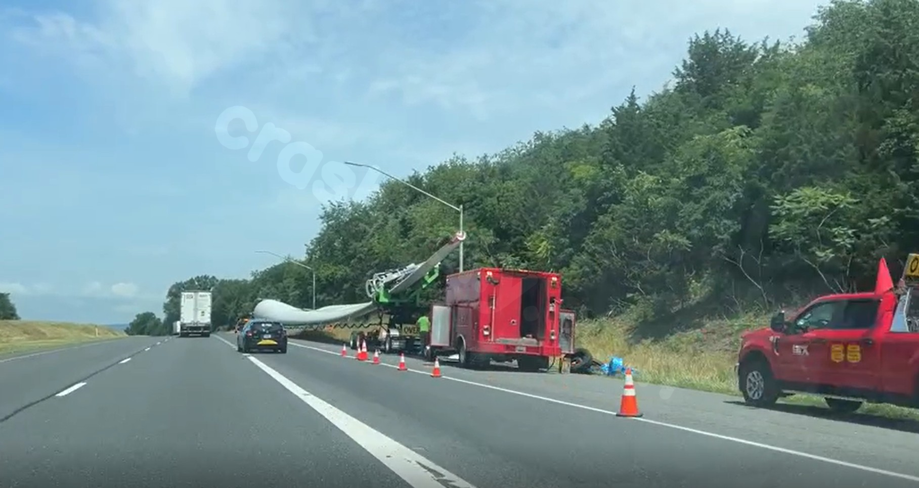 Wind turbine blade crashes into I-70, injuring one