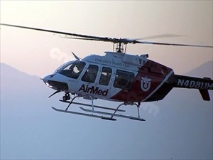 Biker flown to hospital with head injuries after Kaysville accident, road shut