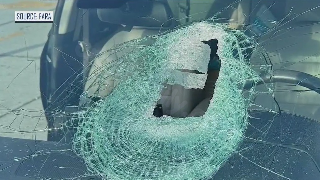 Object smashes through car windshield, narrowly missing driver on I-95