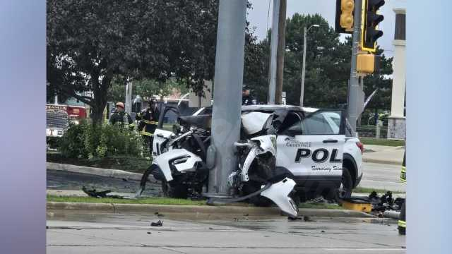 Officer from Greendale injured in Franklin collision.