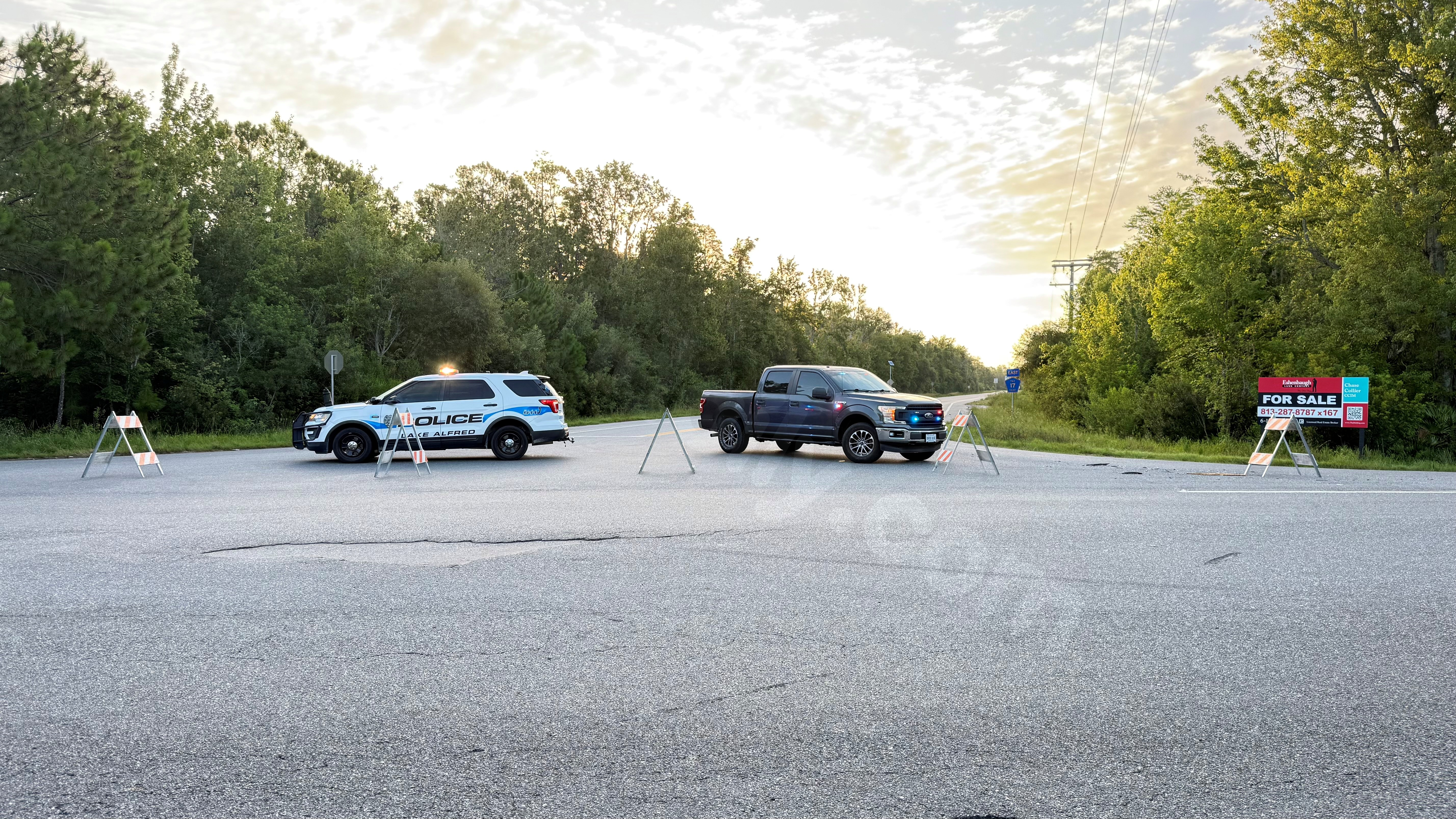 Deadly collision involving dump truck and car shuts down Polk County road