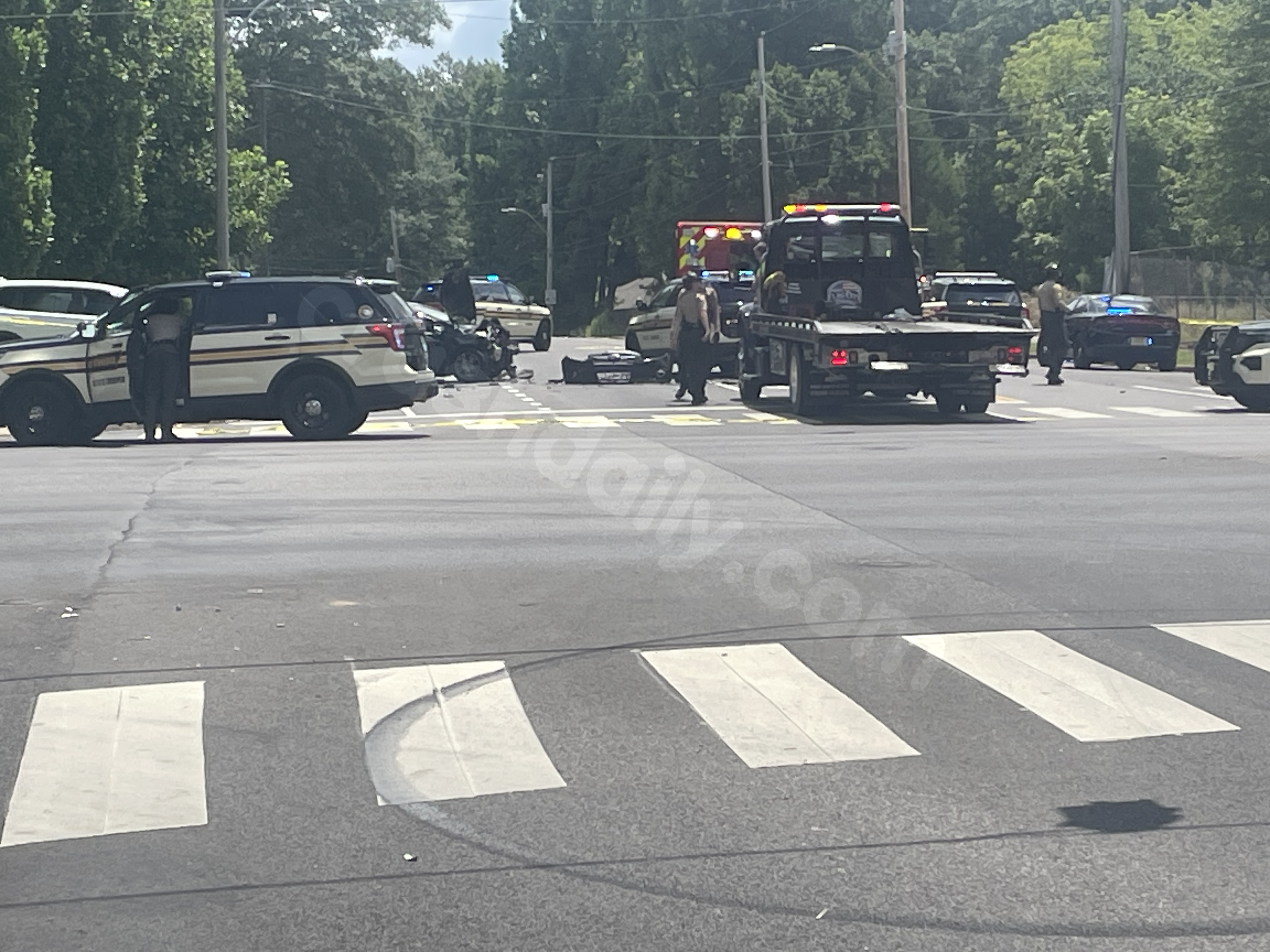 Driver crashes into car after jumping curb during chase