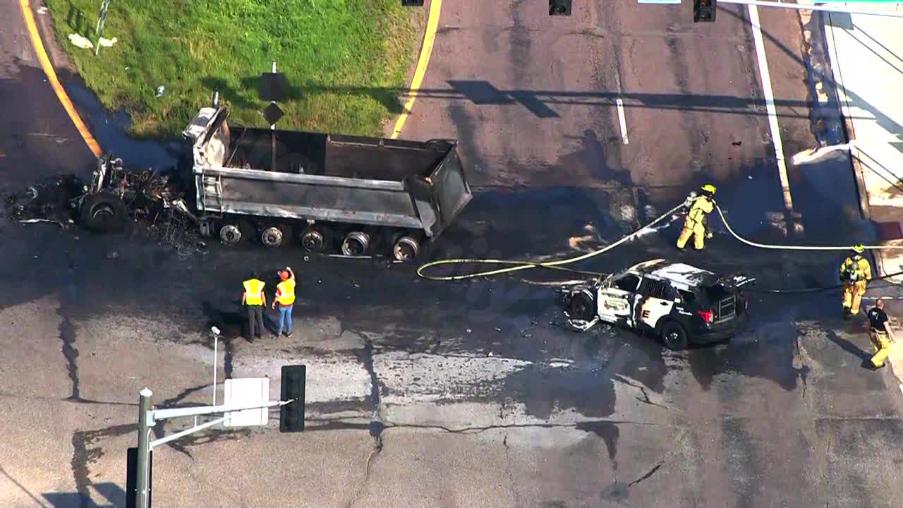Police car collides with tanker on County Road 101.