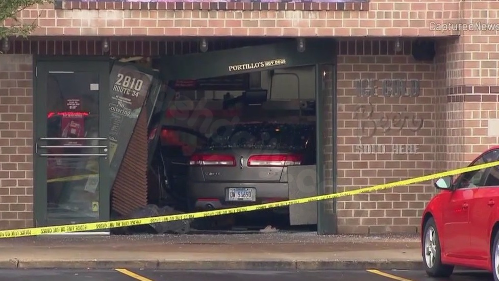 Car smashes into Portillo's restaurant in Oswego, injuring 14, according to police.