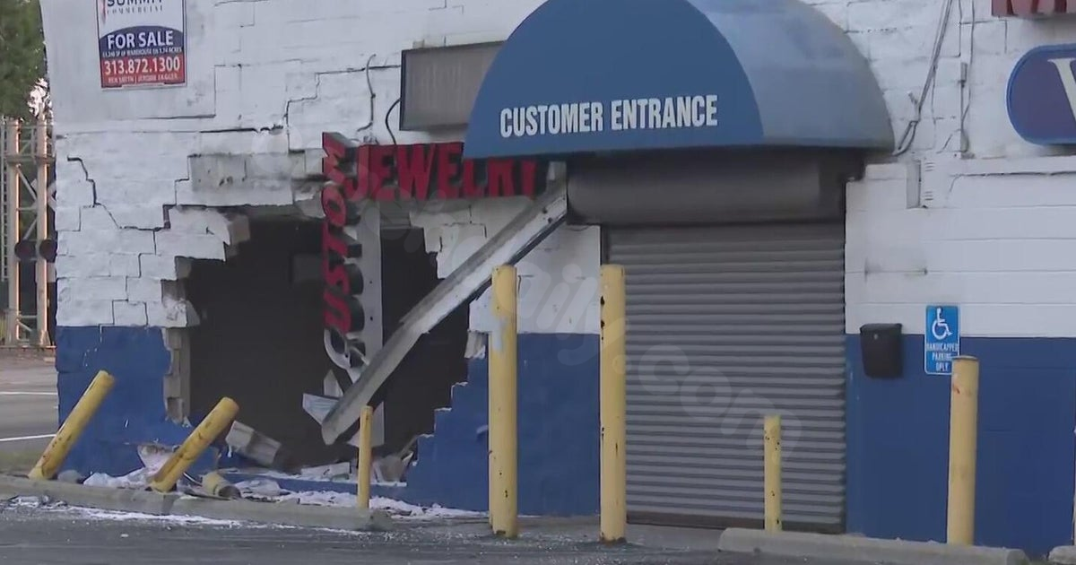Four individuals affected in Detroit as vehicle crashes into furniture store.