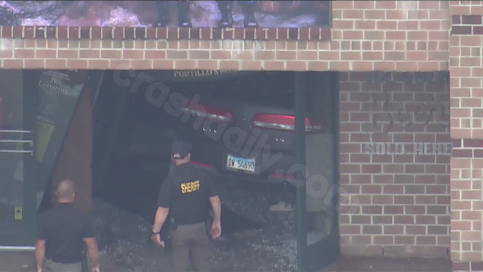 Unclear injuries following car collision at Portillo's in Oswego
