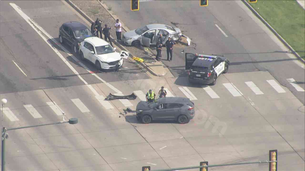 Two arrested following police pursuit resulting in multiple car collision in Aurora.