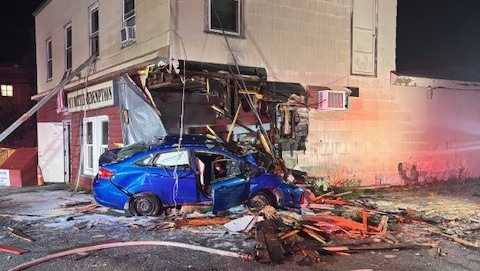 Car accident ignites fire at Lewiston bottle redemption center and driver faces charges