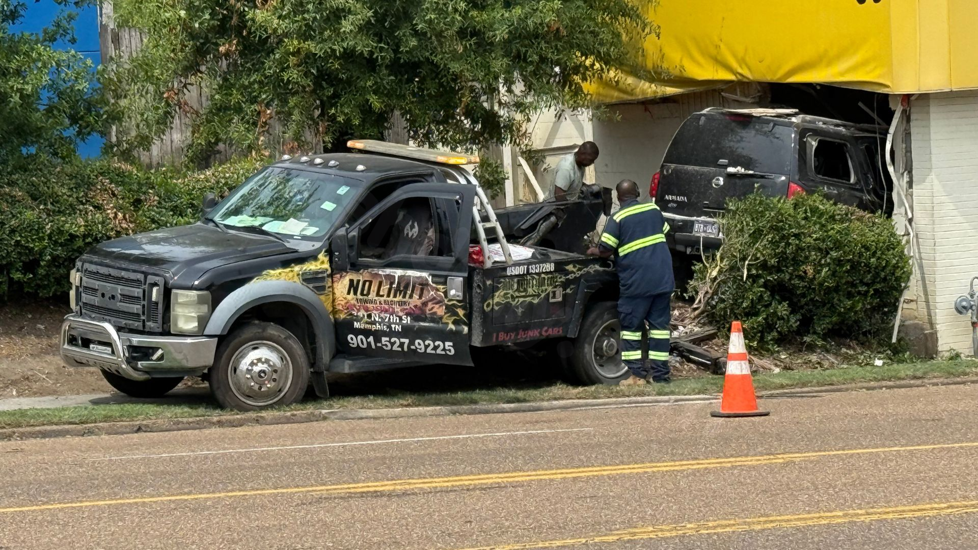 Police investigating after car collides with business on South Third Street.