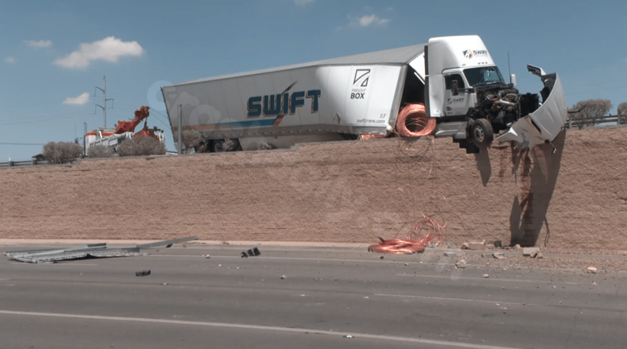 VIDEO: Semi-truck dangling from I-10 following collision