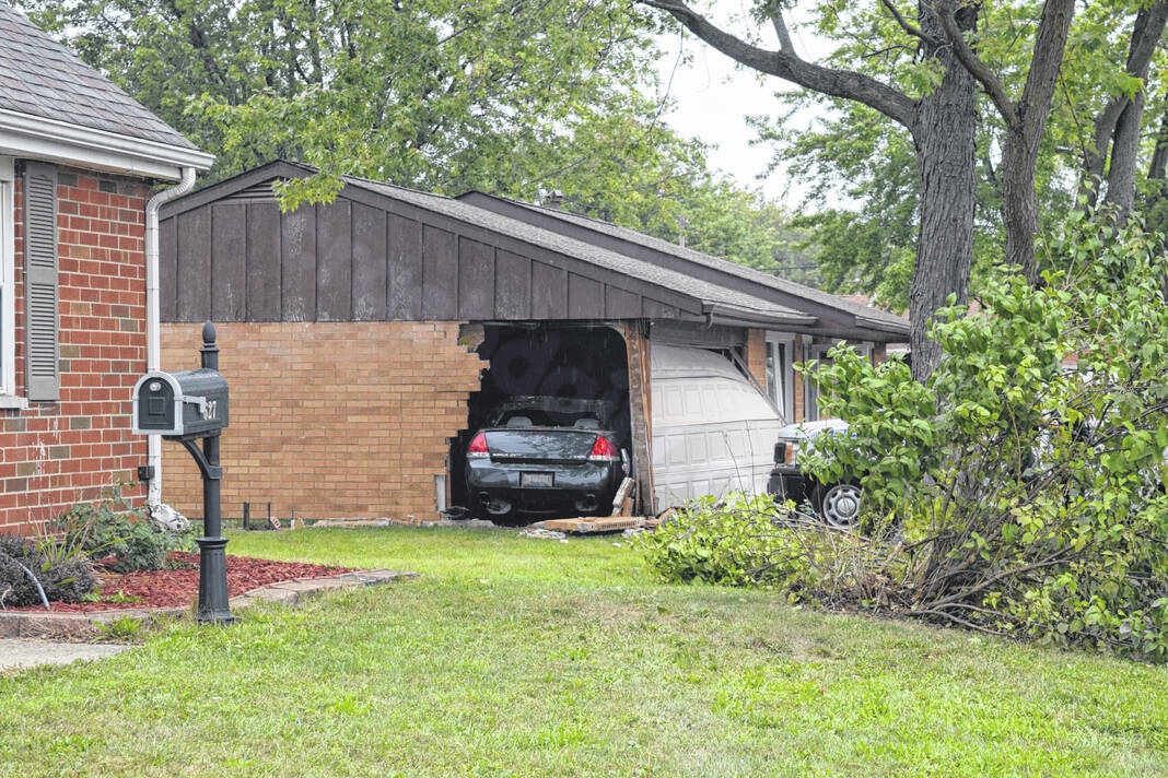 Sidney garage hit by car.