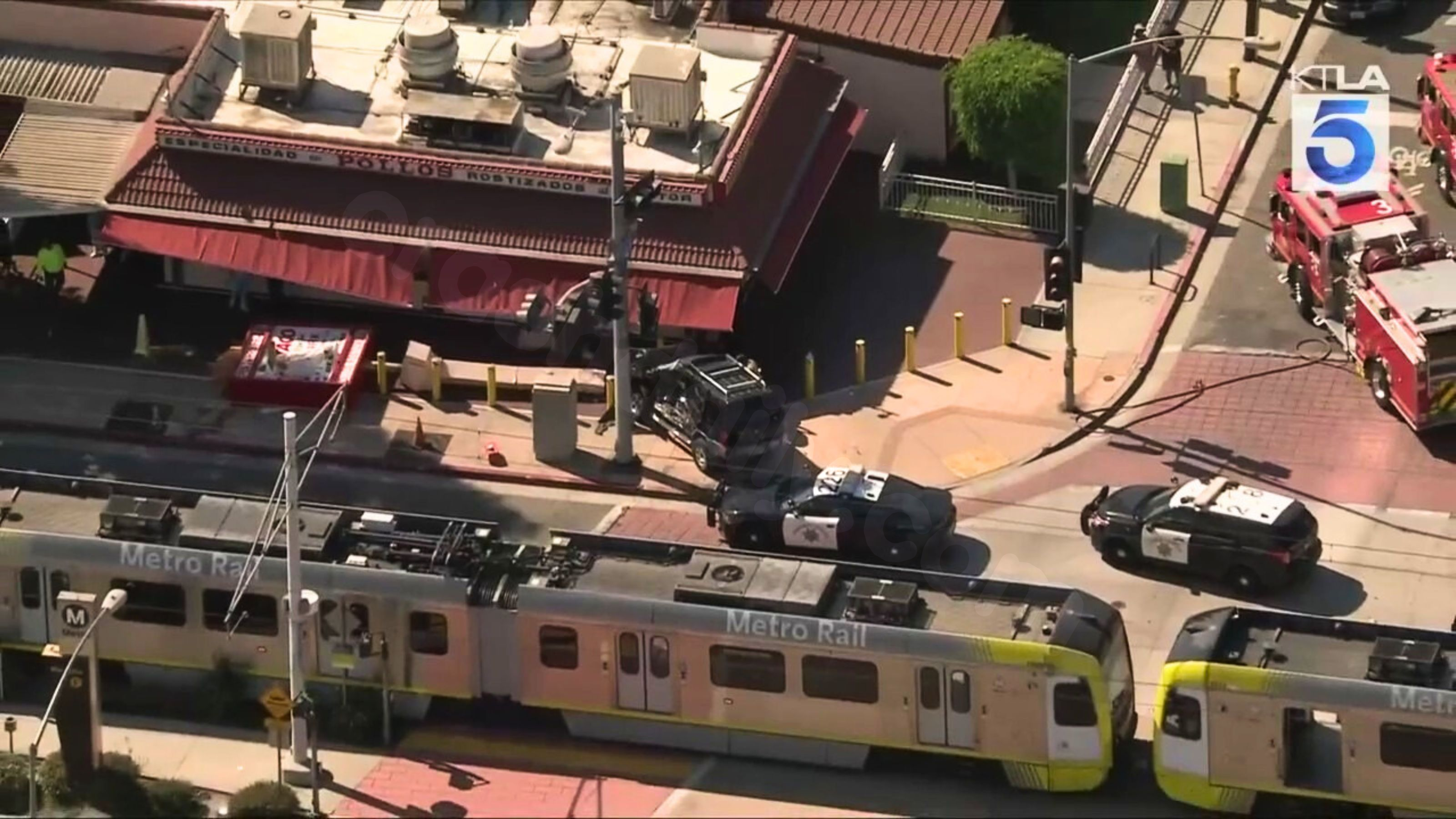 Vehicle crashes into train, rams into King Taco in East LA