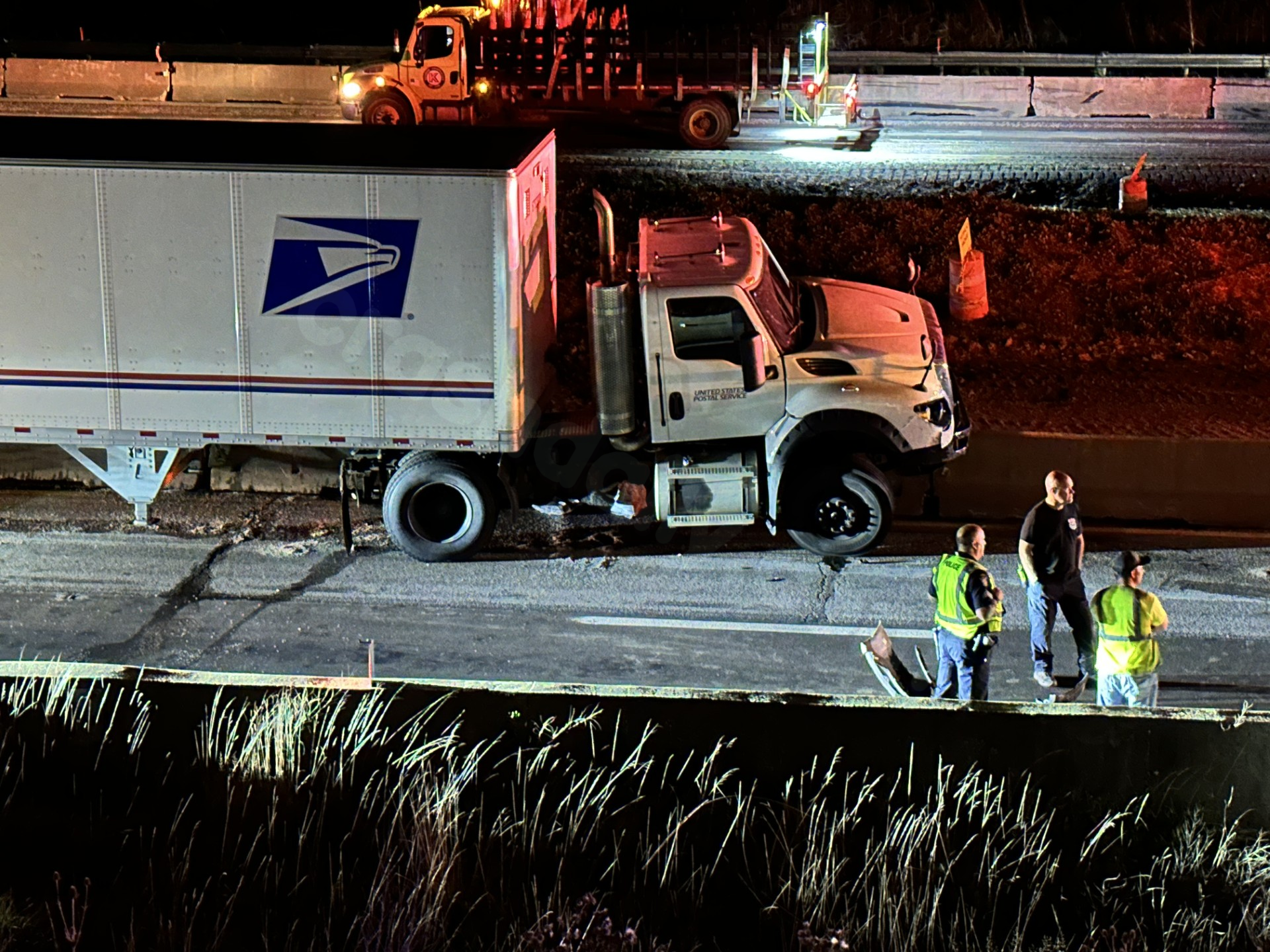 Collision between USPS mail truck and car on I-77