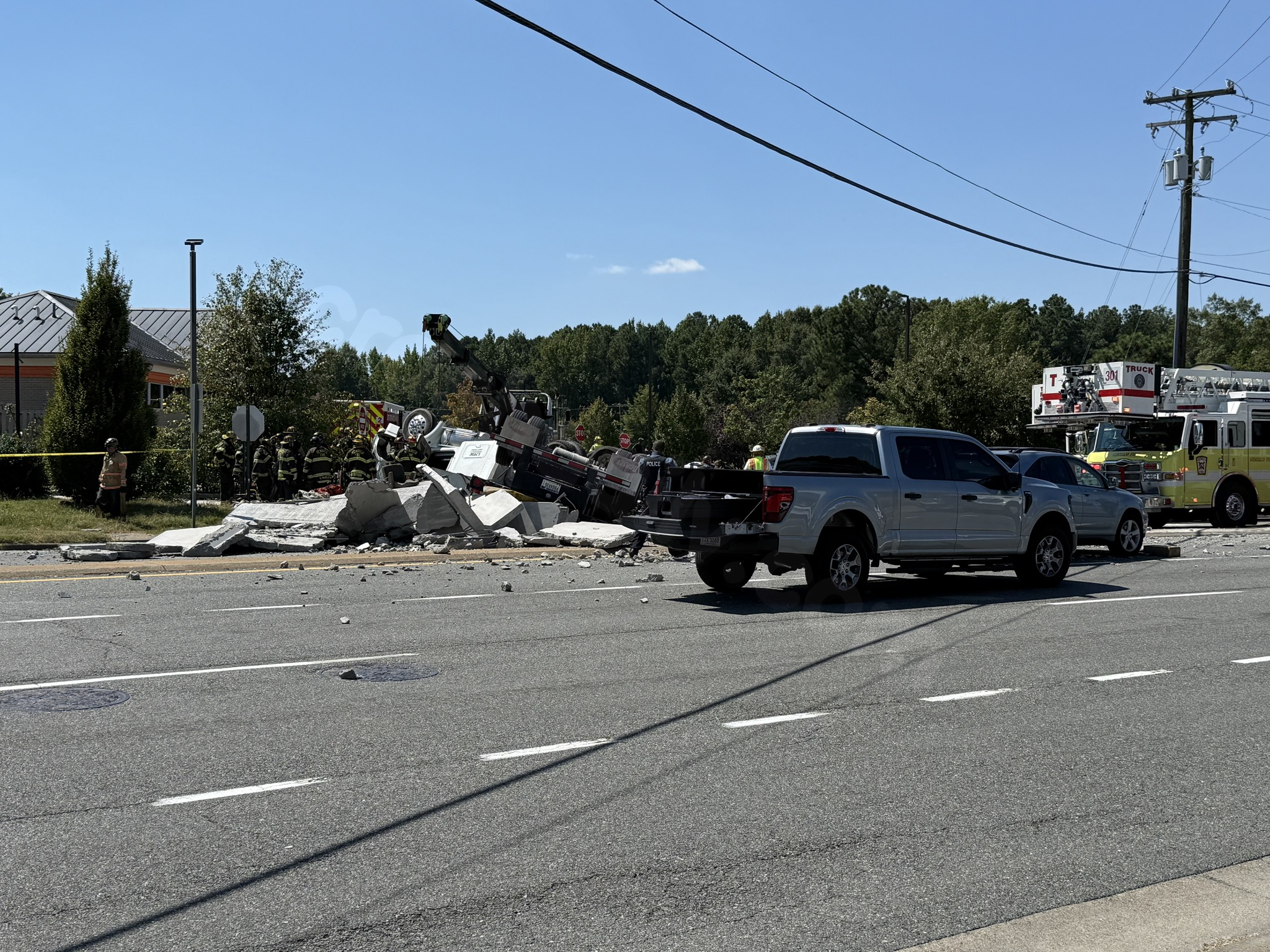Fatal collision between pedestrian and propane truck at Williamsburg Road intersection.
