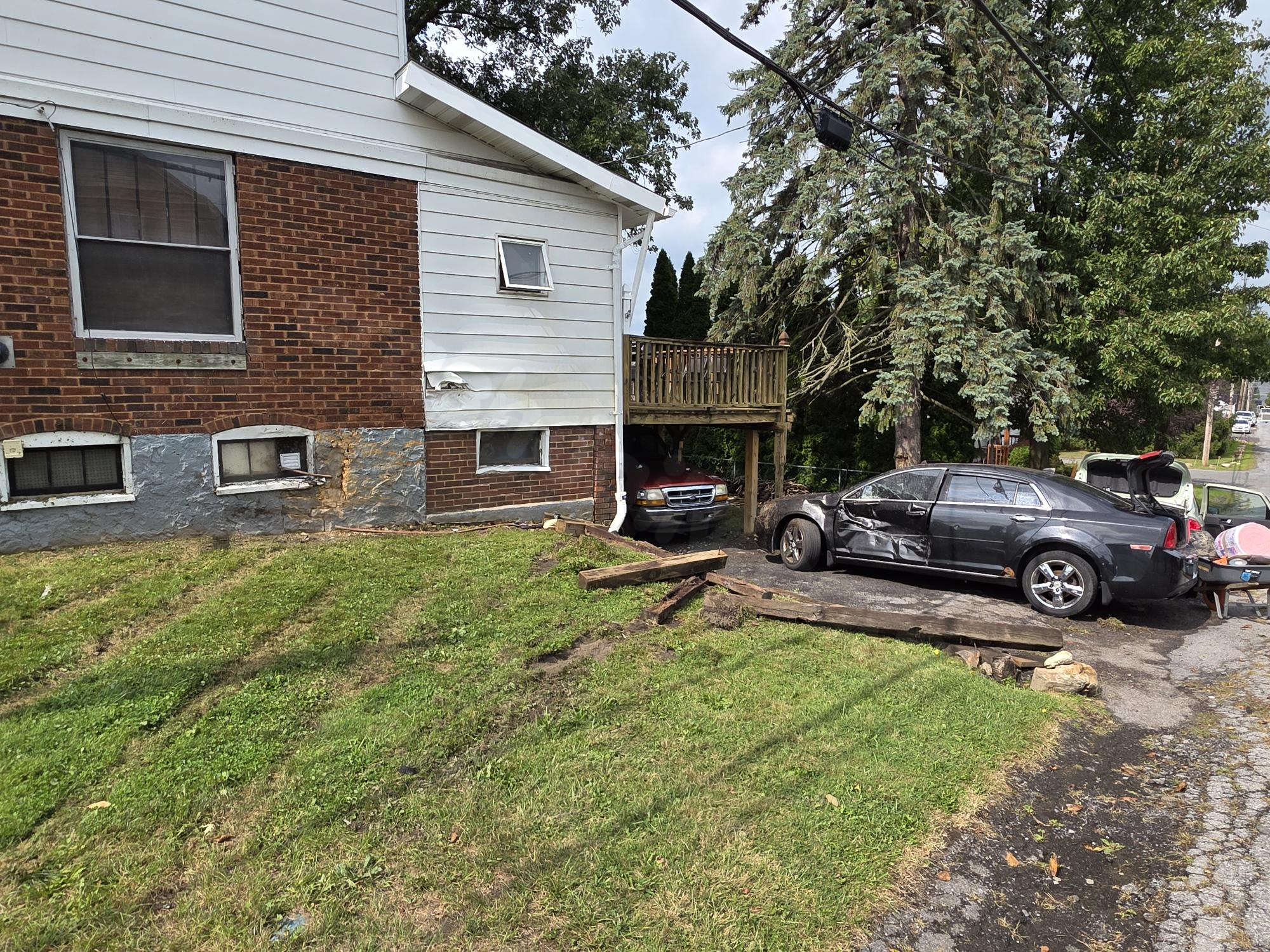 Fatal crash as vehicle collides with structure in Altoona.