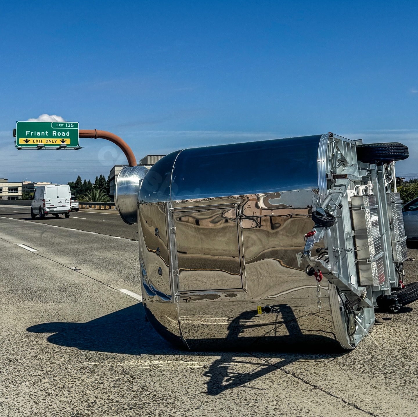 Highway 41 trailer rollover due to faulty safety chains