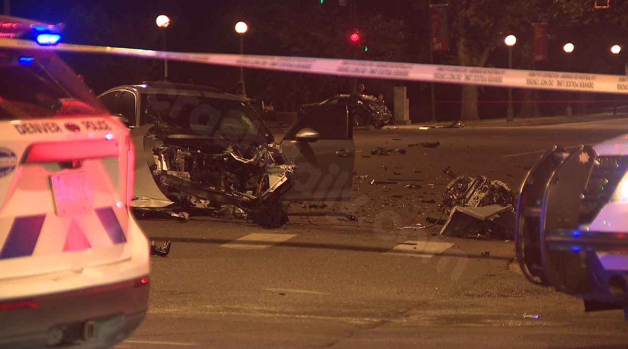 Engine of car spotted on Speer Blvd post-accident, injuring two on Saturday morning