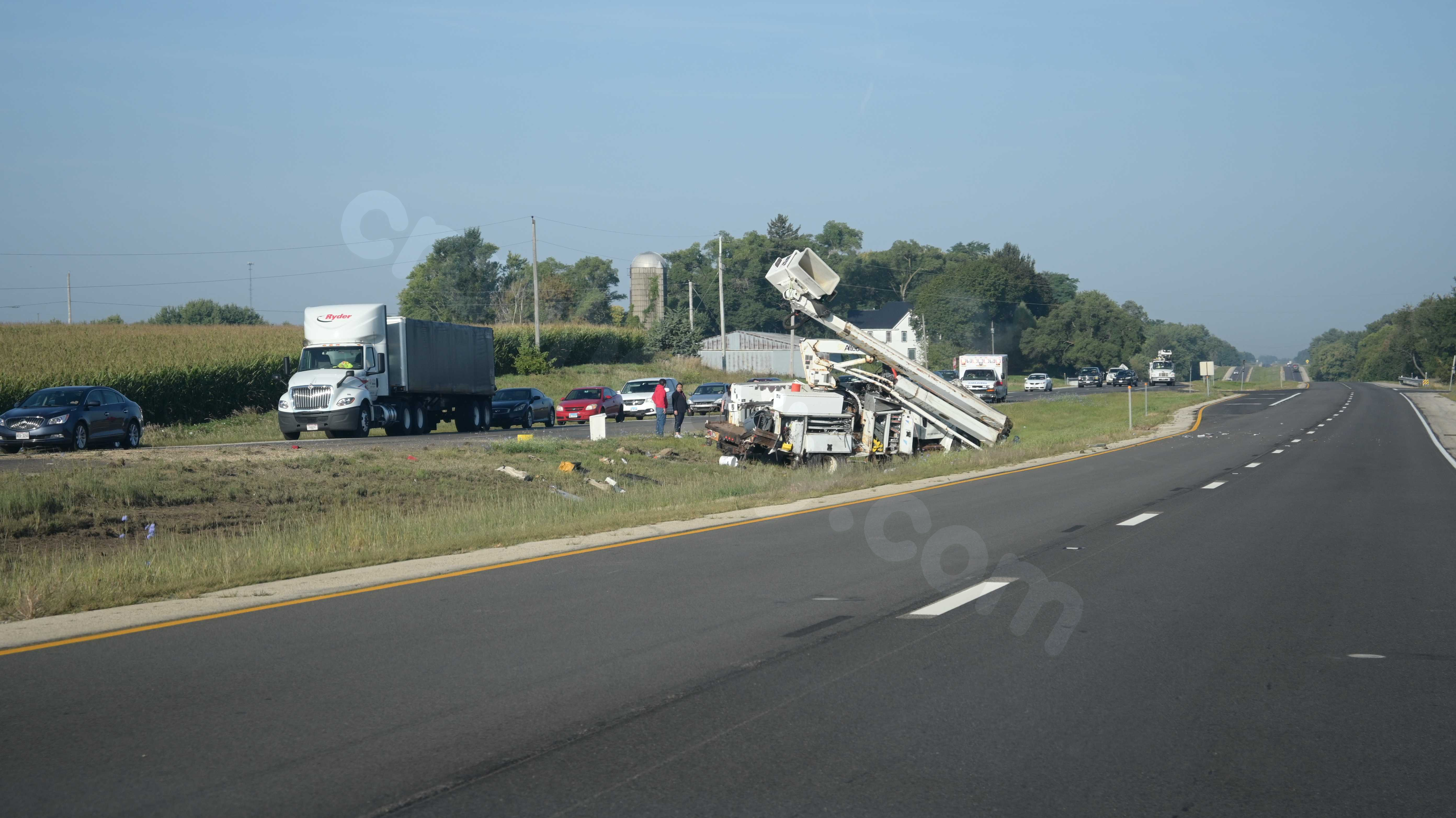 One person injured in utility truck crash on U.S. 20