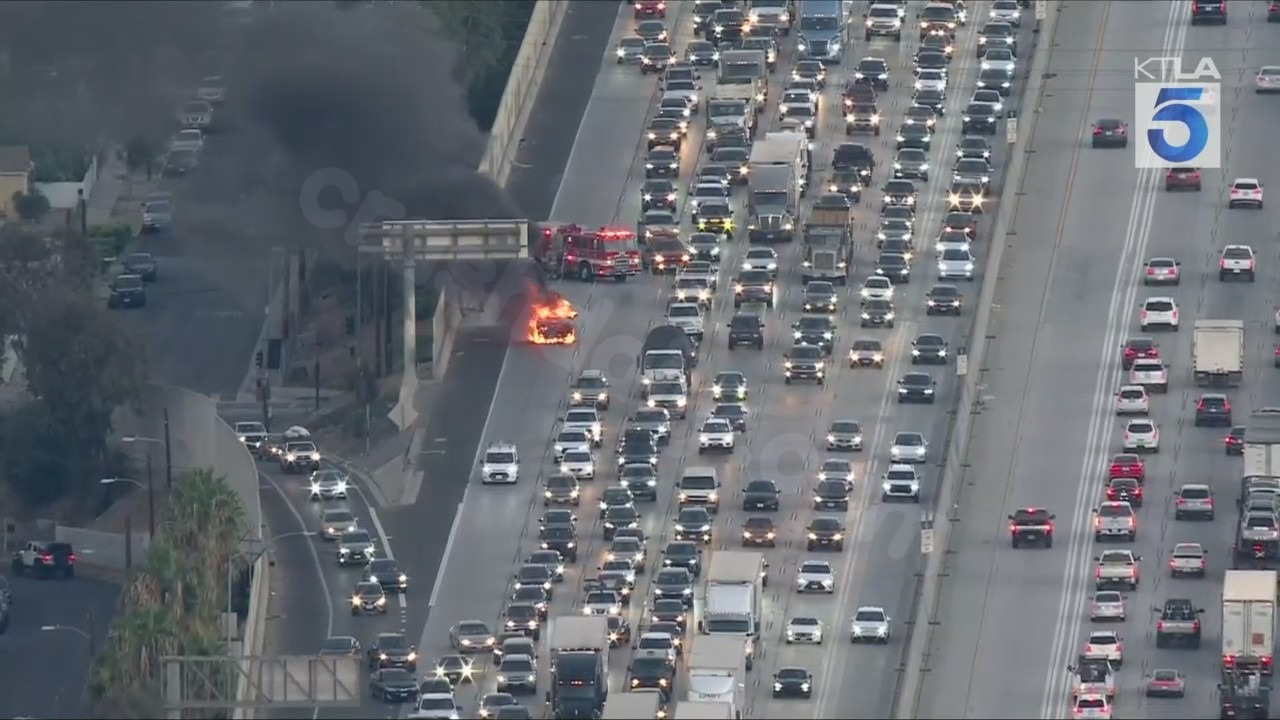 Traffic halted on 5 Freeway due to motorcycle accident and car fire in the early morning
