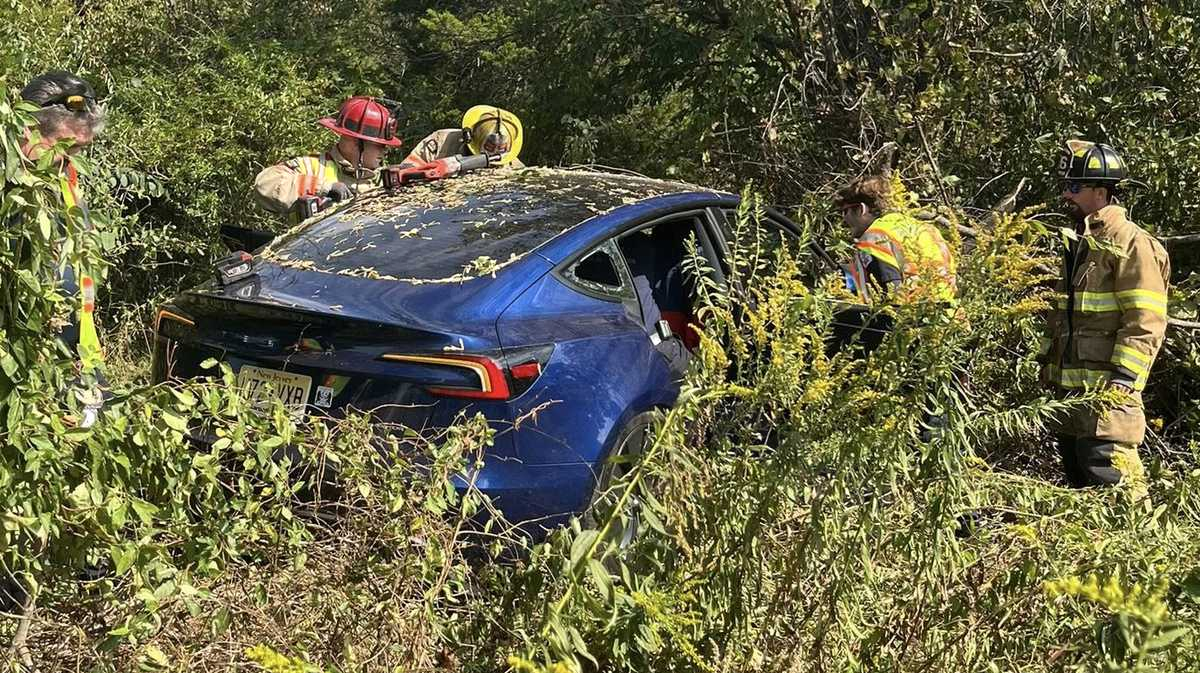 Emergency crews use cutting tools to extract trapped individual from car 300 feet off I-83 in York County
