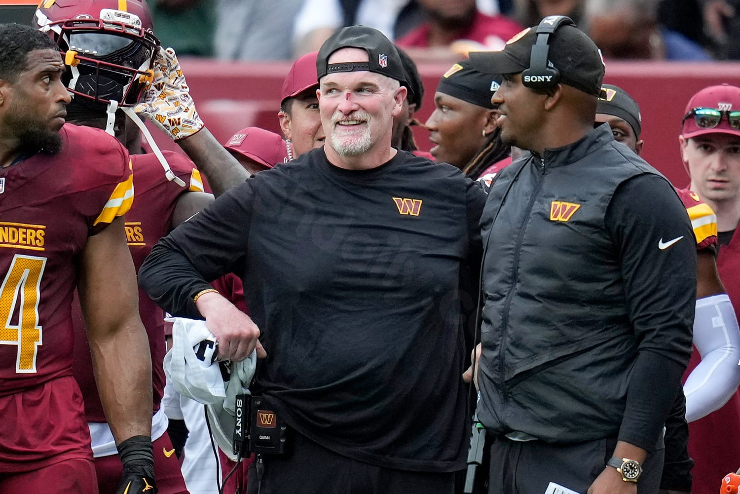 Dan Quinn, Commanders coach, gets injured in sideline collision