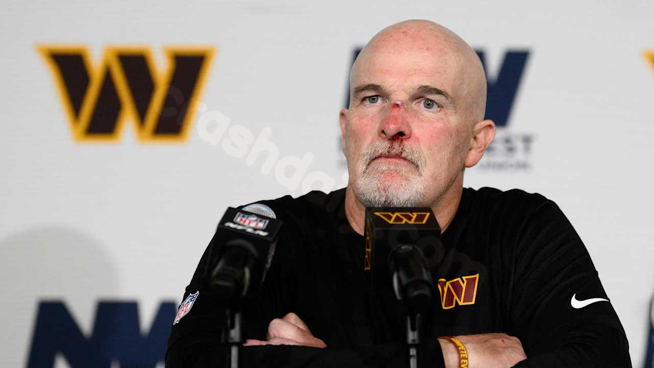 Commander HC Dan Quinn injured in collision with Marcus Mariota during victory against Raiders.