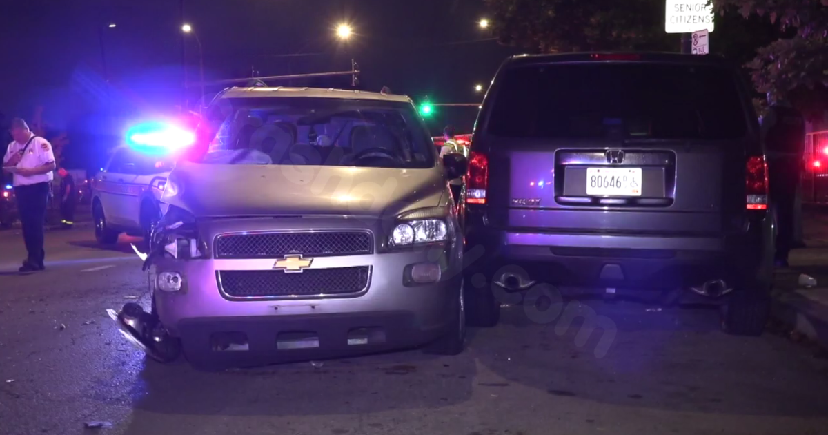 Two individuals transported to ambulances following a severe collision in Grand Crossing, Chicago