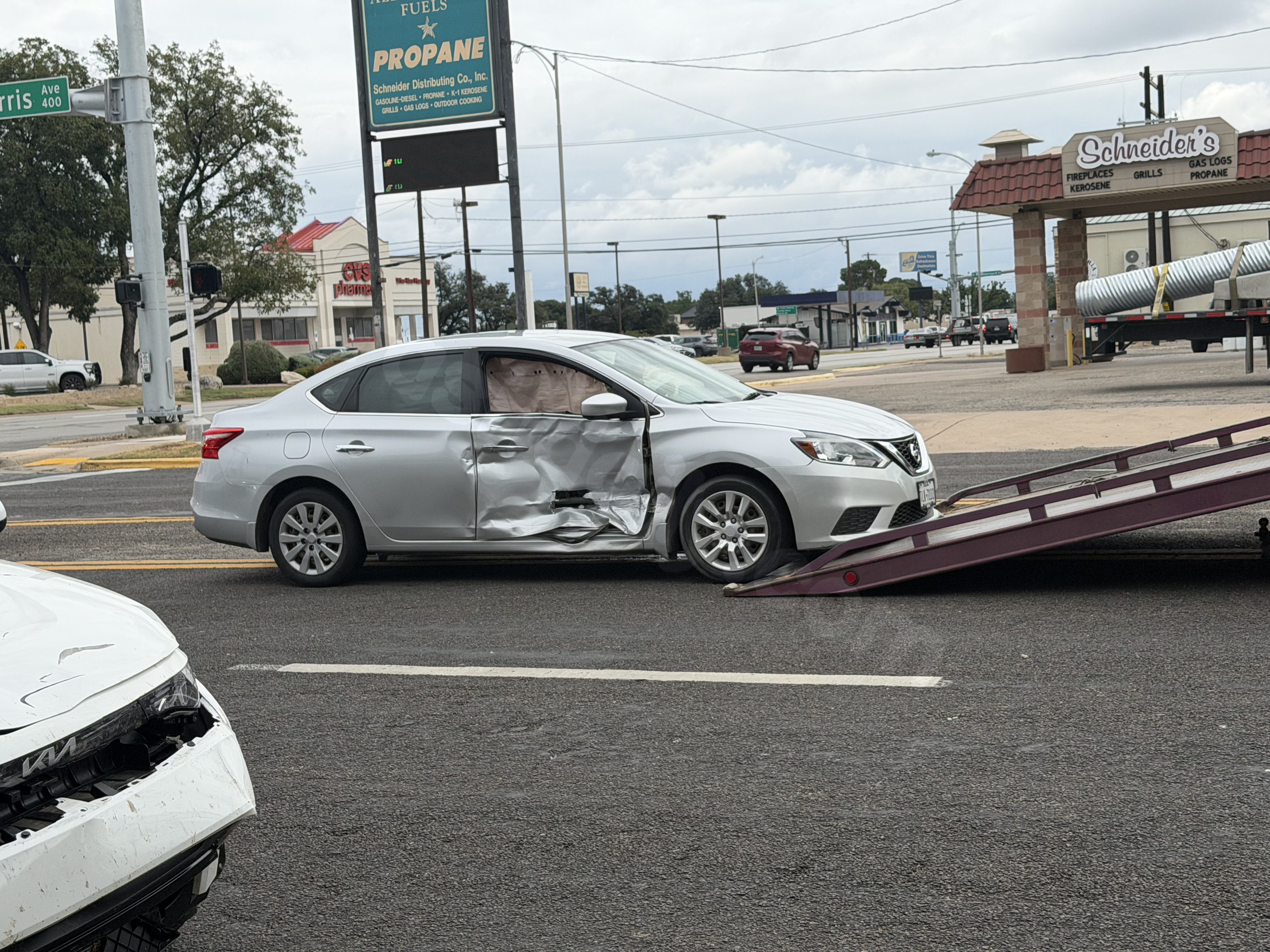 Three individuals hospitalized following collision at West Harris and South Abe