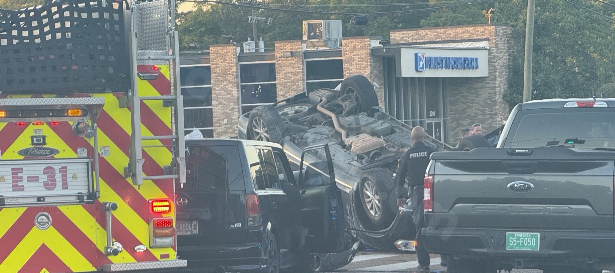 Unmarked vehicle crashes and lands on top of car in Frayser, eyewitnesses report