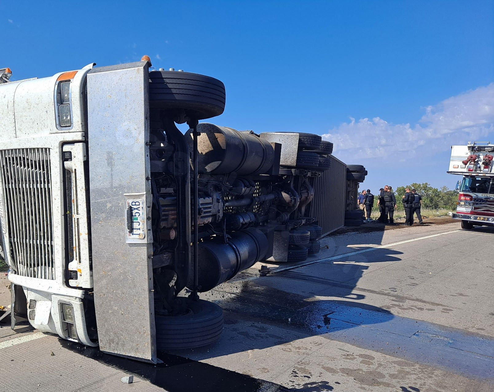 Driver injured in cattle truck rollover accident in Harvey County
