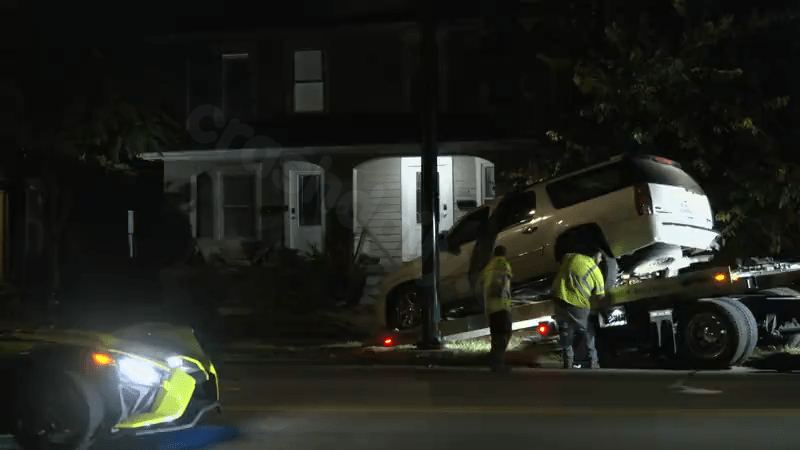 Vehicle collides with car and front porch of house in Dayton