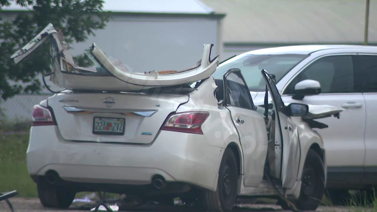 Car collides with school bus in New Smyrna Beach, injuring 1, officials report